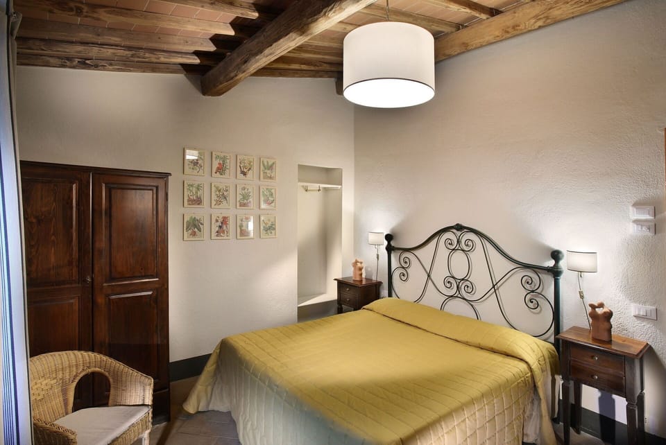 agriturismo-la-papessa-chianti-san-donato-farmhouse-melograno-bedroom
