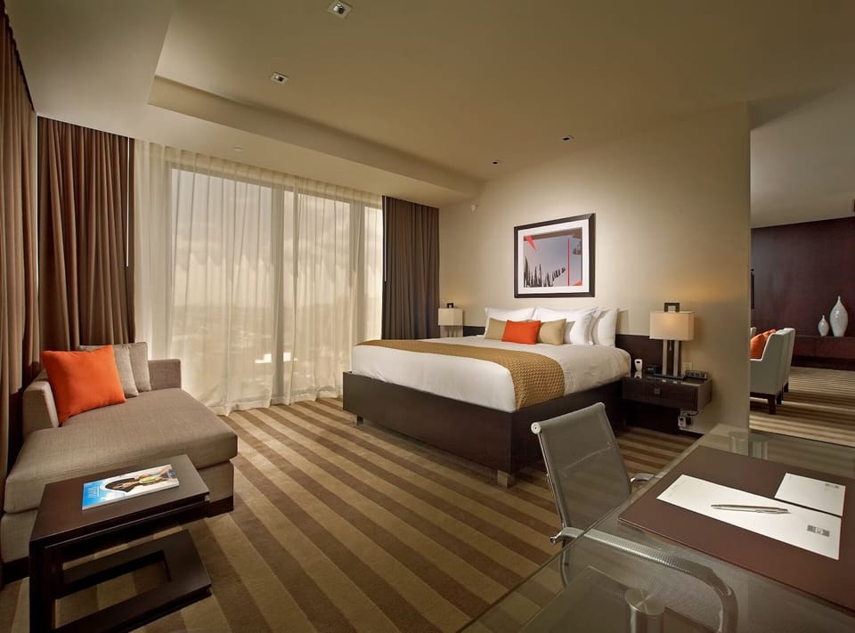 Unit with 1 King bed. Exact unit will be assigned upon arrival. Views, colors, and decor may vary.