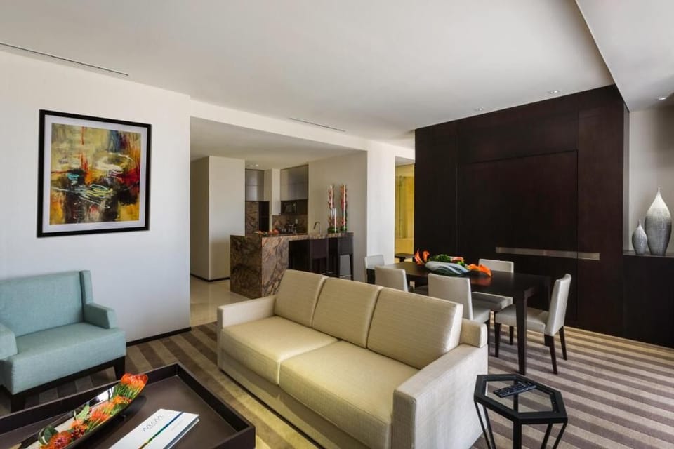 Unwind together in an expansive lounge with modern art accents.