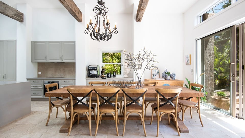 Crafted from rich, sturdy wood, this table is as beautiful as it is functional. Its generous size comfortably accommodates up to 10 guests.