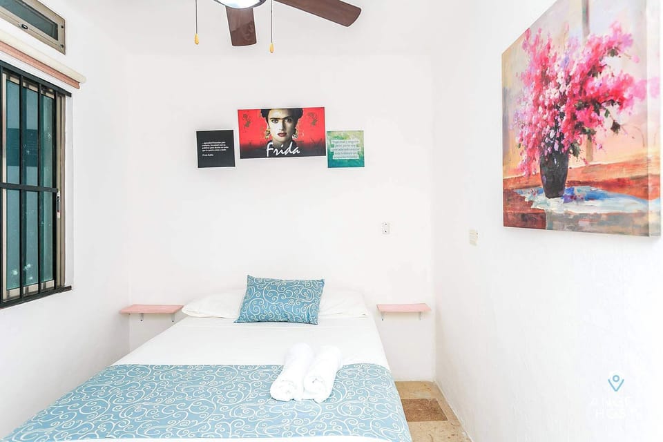 Bedroom 2 features a double/full bed for two more guests