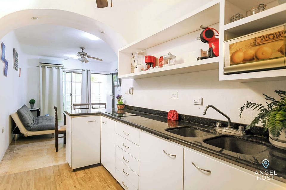The kitchen opens to the living/dining area; great for interacting together