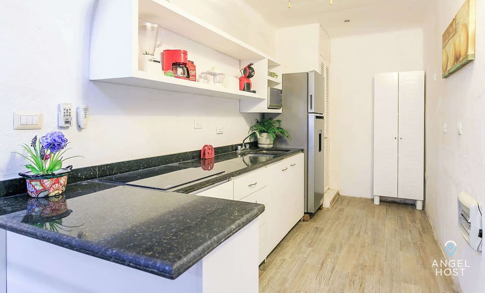 A fully-equipped kitchen for making meals in the comfort of home