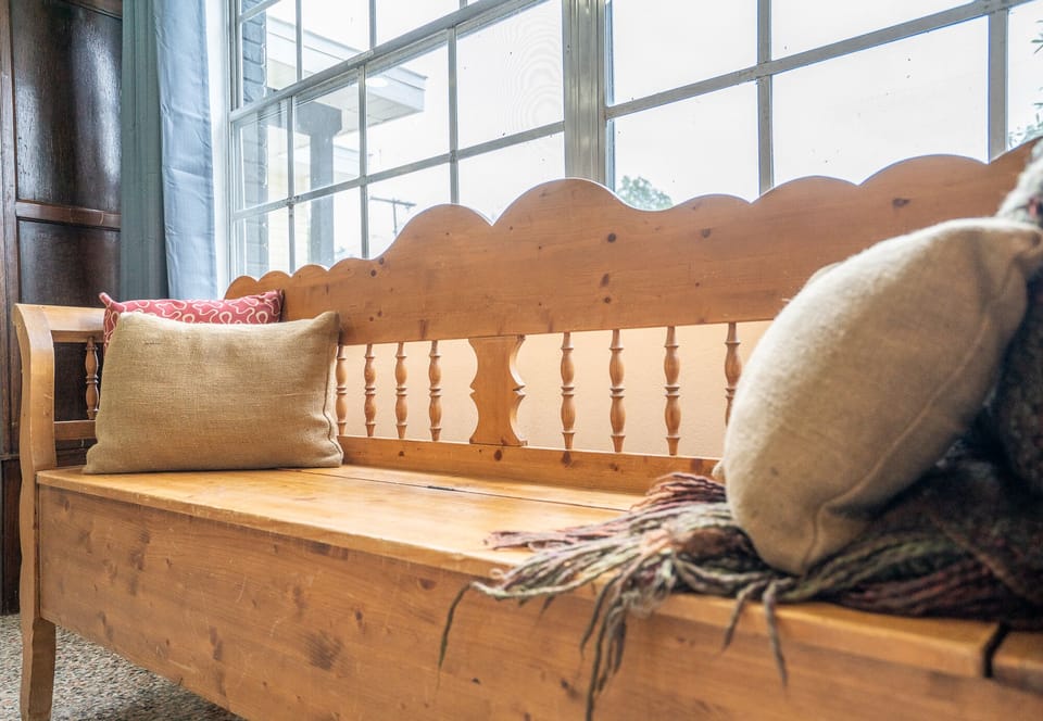This bench in the living room provides additional seating.