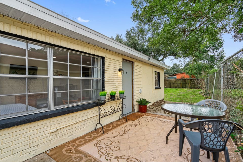 Outdoor entrance with smart lock and outside seating. Best spot ever to have breakfast!