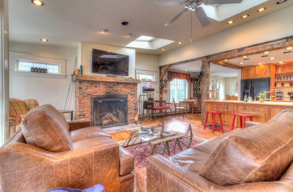 Enjoy a movie and some theater style popcorn in our living room and open kitchen