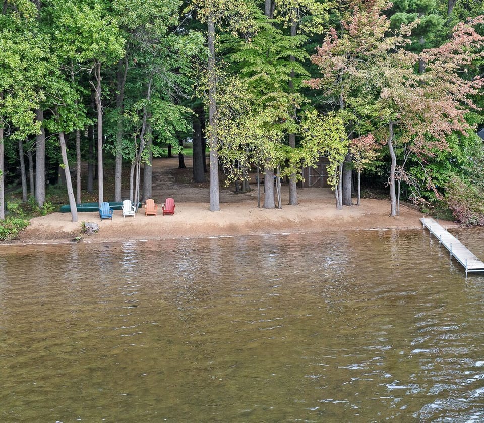Use the canoe behind the chairs, or tie your boat or sunbathe on our dock.