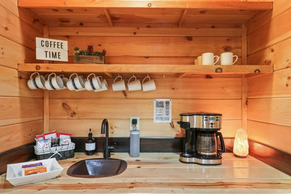 Fully stocked coffee bar with variety of teas to enjoy.