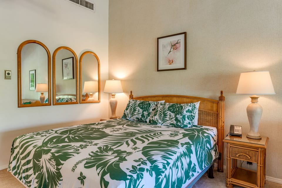 Rest easy on a plush king-size bed beneath vaulted ceilings and island-inspired décor.