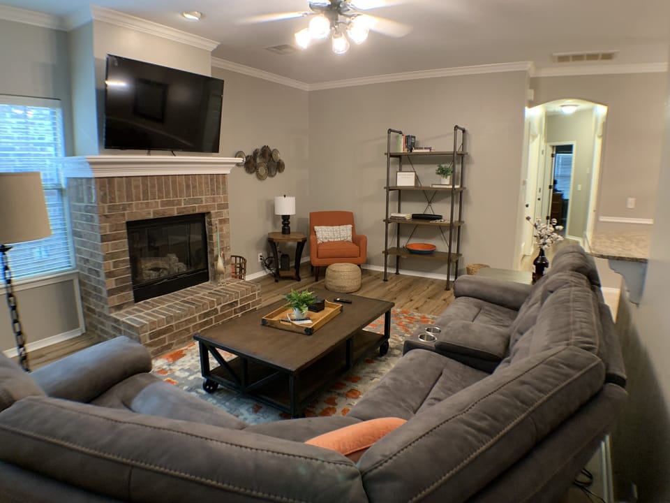 Living Room. Each end of the sectional is an electrical controlled recliner.