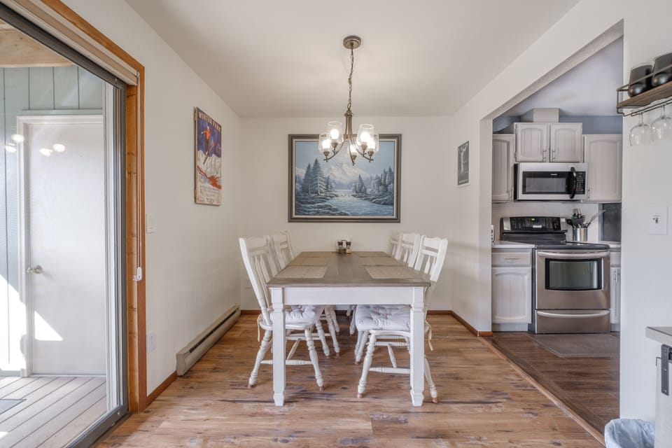 Delight in a meal together or play games at the large table that seats six. 