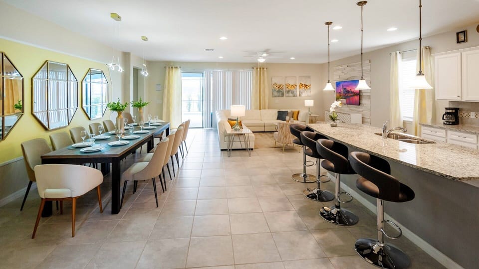 Spacious open-concept home with a sleek kitchen, elegant dining, and cozy living!