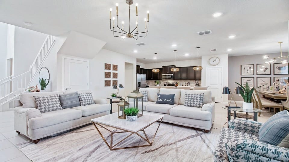 Living Room: Spacious and inviting, the area features a cozy sofa.