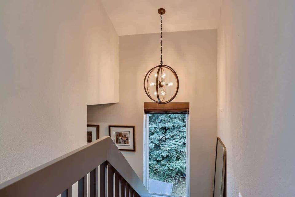 Stairway from top level master suite to 2nd and main levels.