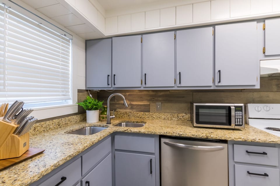 Kitchen essentials are provided. 