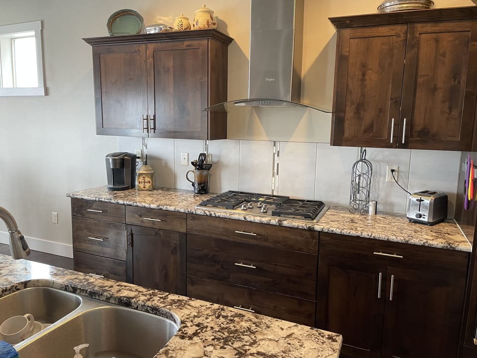Well-stocked kitchen with Keurig coffee maker