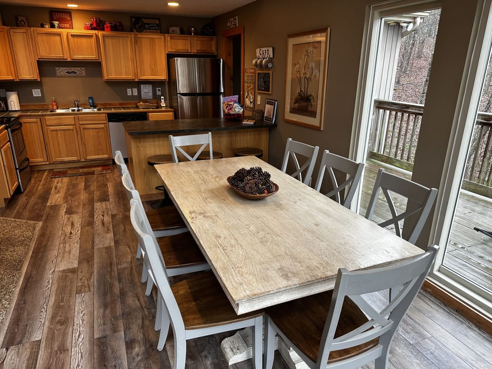 Dining room table to accommodate 8 and 3 barstools at the counter.  