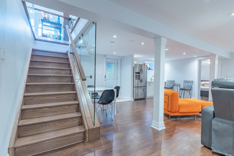 The lower level is bright and offers more seating and a kitchenette