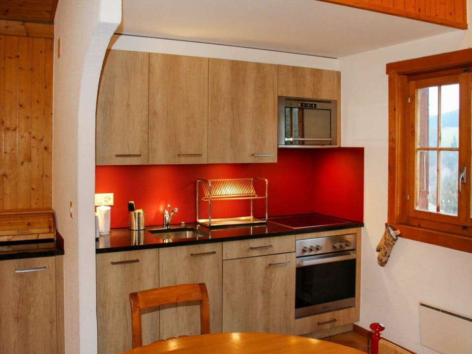 Cabinetry, Countertop, Building, Property, Furniture, Window, Kitchen, Kitchen Appliance, Kitchen Stove, Wood
