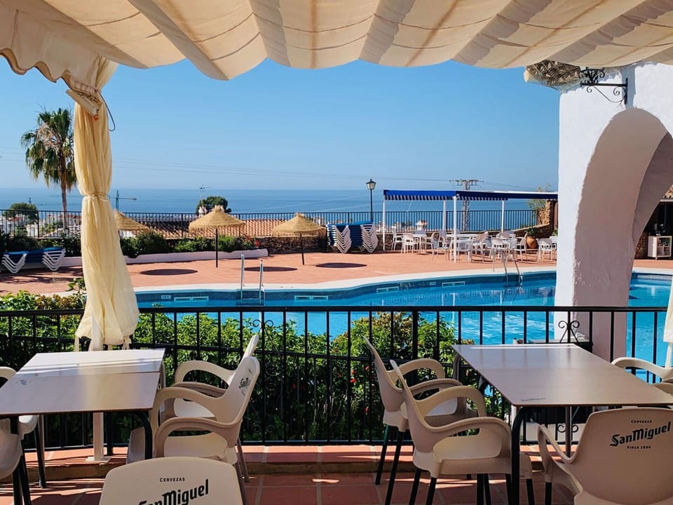 Water, Sky, Plant, Furniture, Property, Table, Chair, Azure, Building, Seaside Resort
