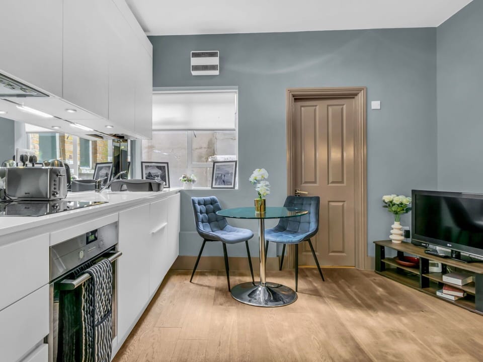 Furniture, Interior Design, Flooring, Floor, Wall, Wood, Cabinetry, Ceiling, Room, Kitchen Appliance
