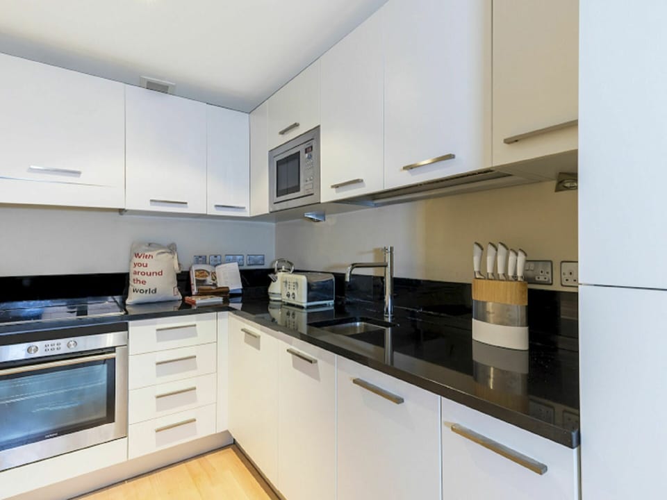 Countertop, Cabinetry, Property, Kitchen Appliance, Kitchen, Kitchen Stove, Home Appliance, Wood, Building, Interior Design