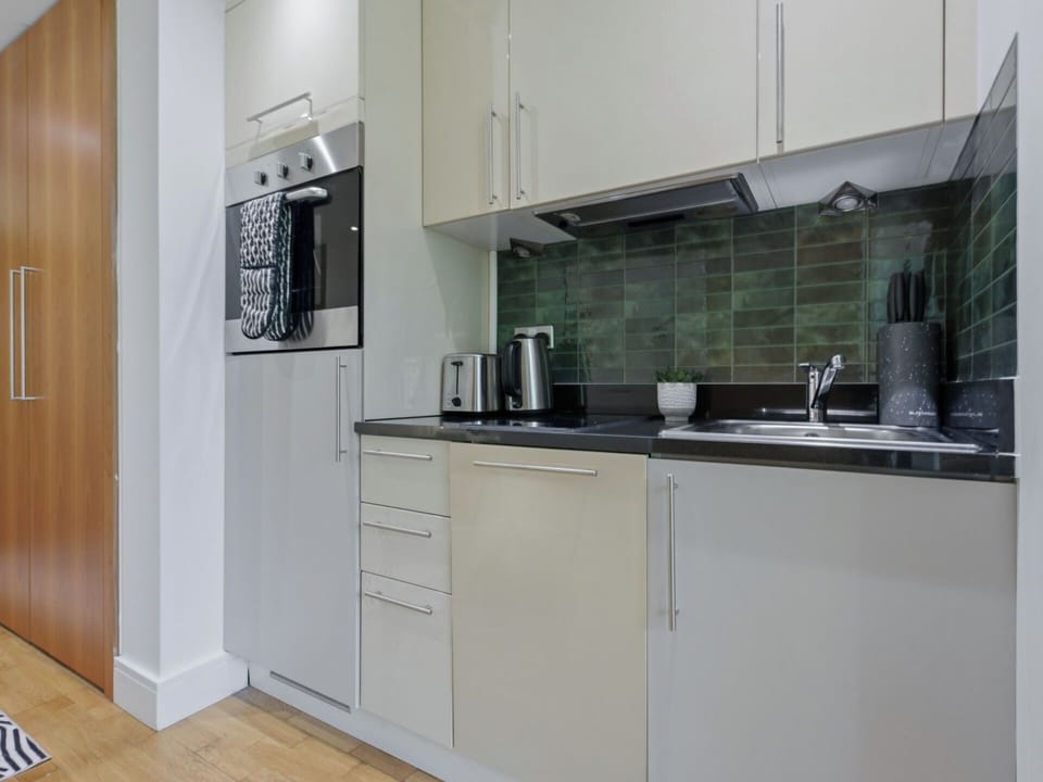 Kitchen Appliance, Major Appliance, Flooring, Interior Design, Kitchen, Countertop, Wood, Floor, Furniture, Cabinetry