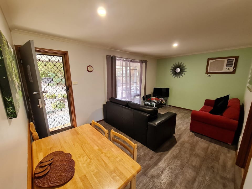 Geranium cottage lounge/dining area. (One can be used as a double sofa bed)