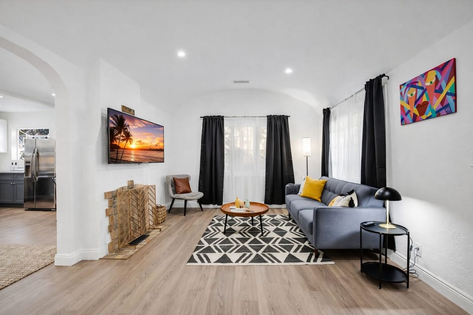 Bright and comfortable living room with Smart TV, fast Wi-Fi, and seating perfect for relaxing after exploring Pasadena.