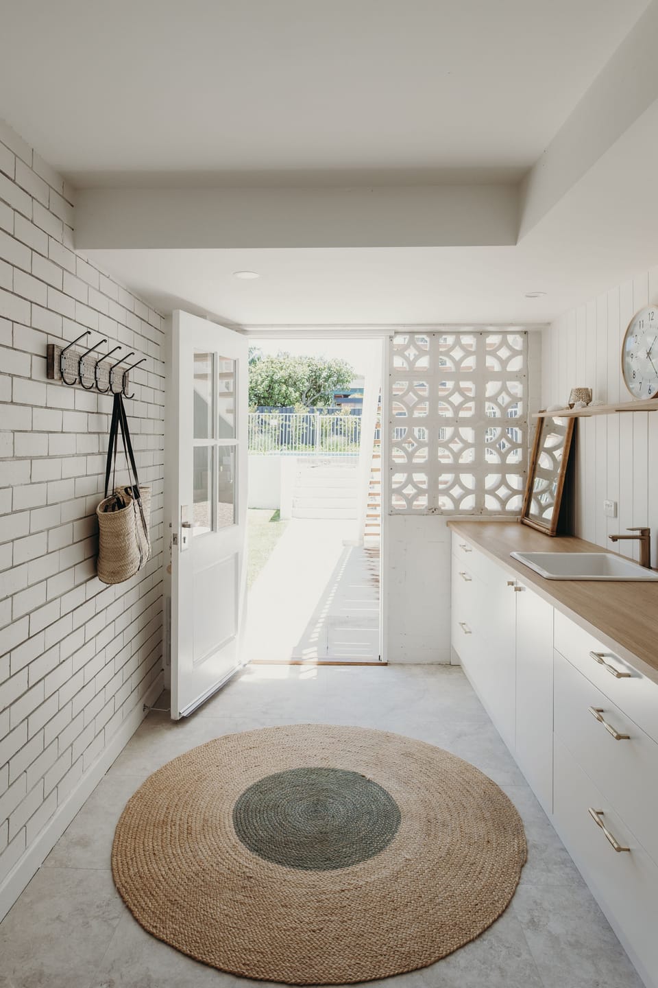 Downstairs Kitchenette leading to pool/backyard
