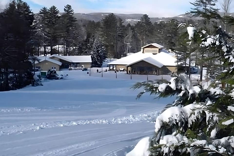 Arrive to a cozy winter retreat nestled in fresh snow.