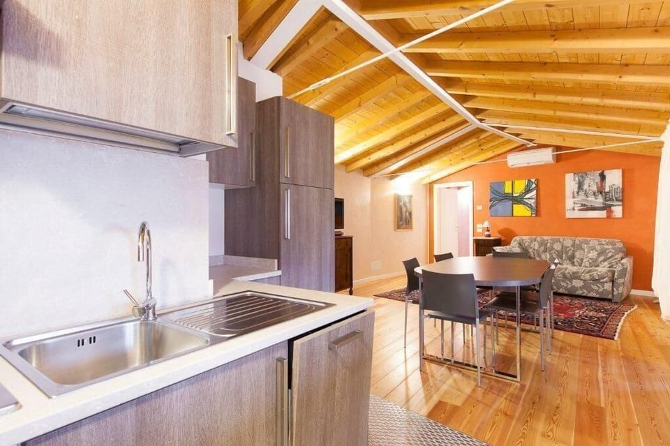 Living room with fully equipped kitchen