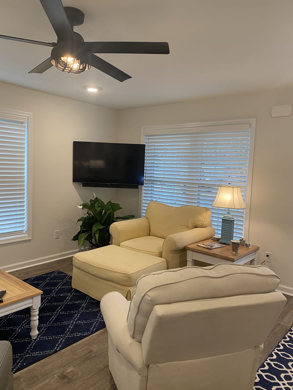 Living room area with 50 inch TV