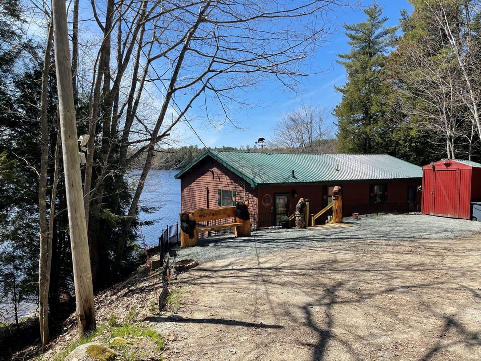 As you drive into the Lodge 2 story home 30 feet from the lake
