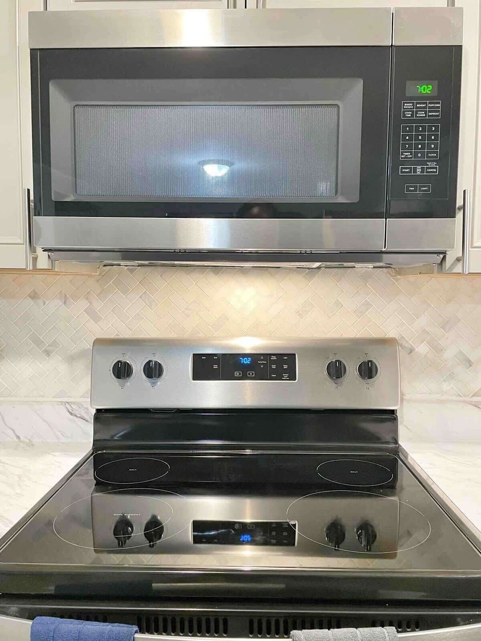 Fully equipped kitchen with stainless appliances and plenty of space.
