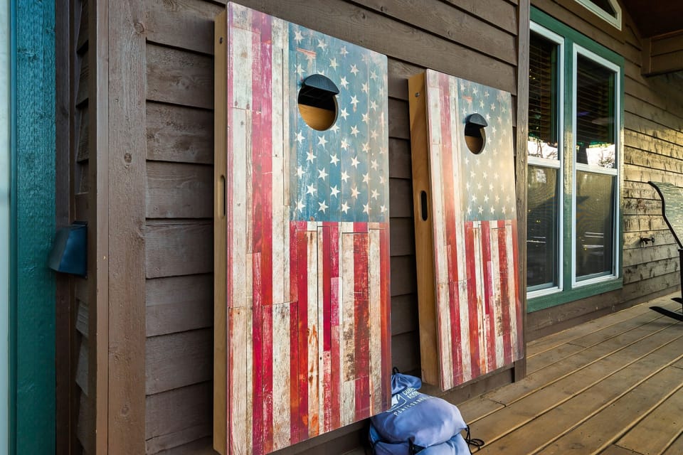 Cornhole on upper screened deck allows for games all year (and no bugs)!