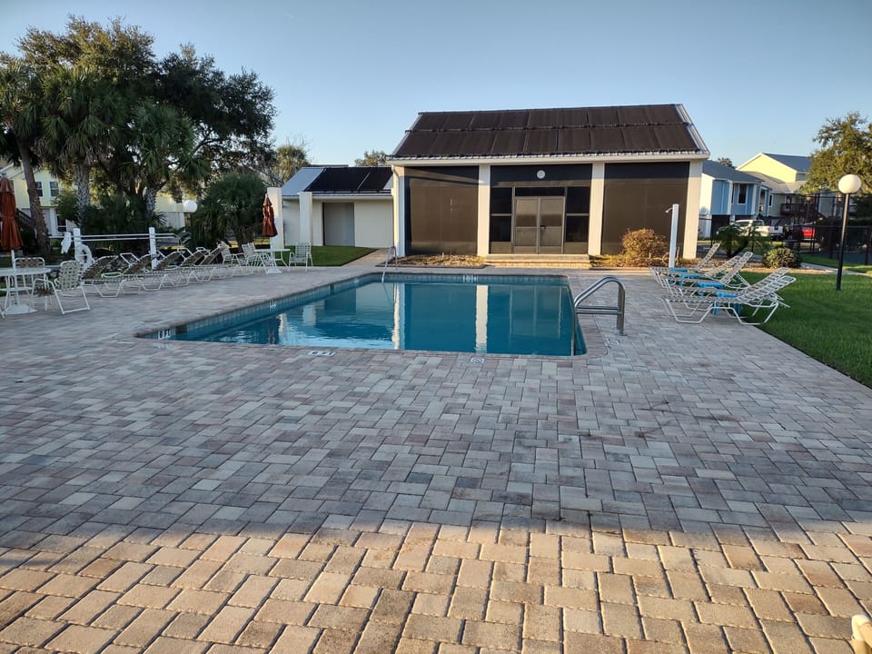 Pool and clubhouse. Steps away from our front door 