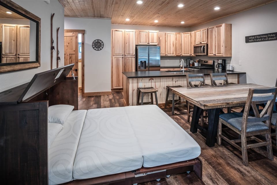 Surprise - the cabinet makes into a comfy murphy bed along with luxury linens