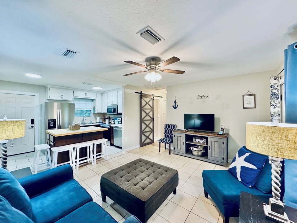 Open Living room is cozy and comfortable and offers fantastic views. 