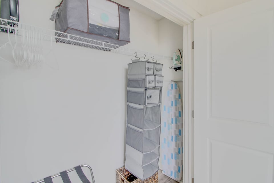 There is plenty of room for storage in the closet! Iron & ironing board + luggage rack + hangers + laundry hamper provided in the closet!