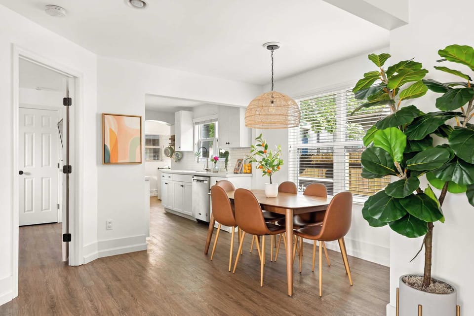 Heading on from the living room, you'll find the dining area with seating for 6