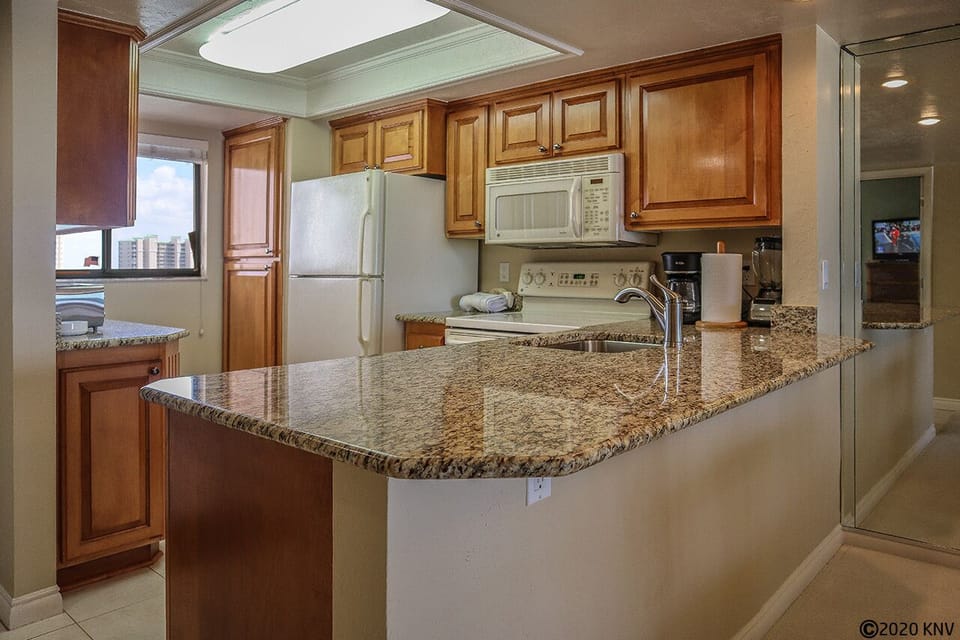 Fully Equipped Kitchen features all appliances and granite countertops