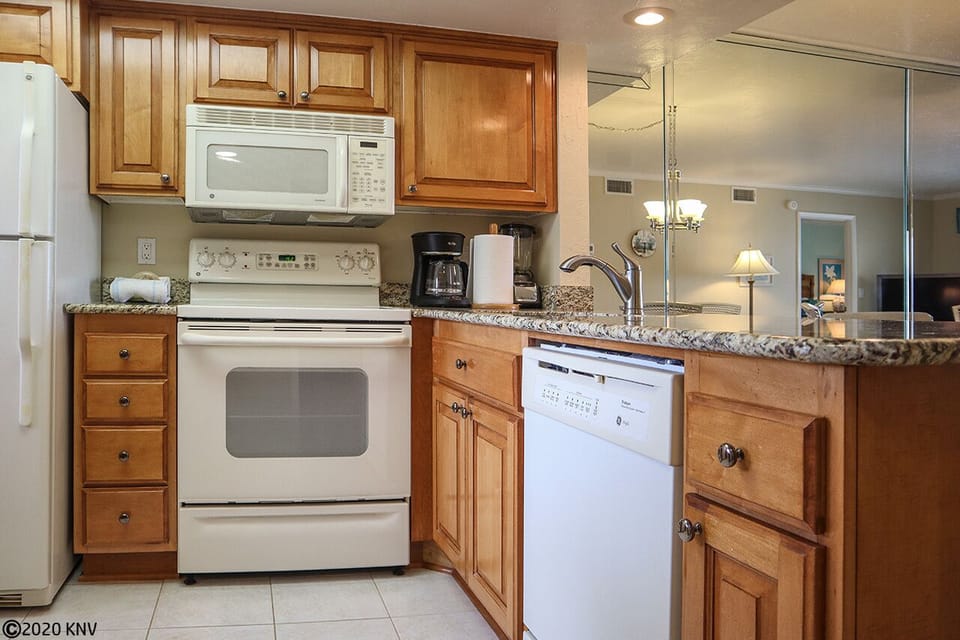 Featured appliances include a dishwasher, washing machine and dryer