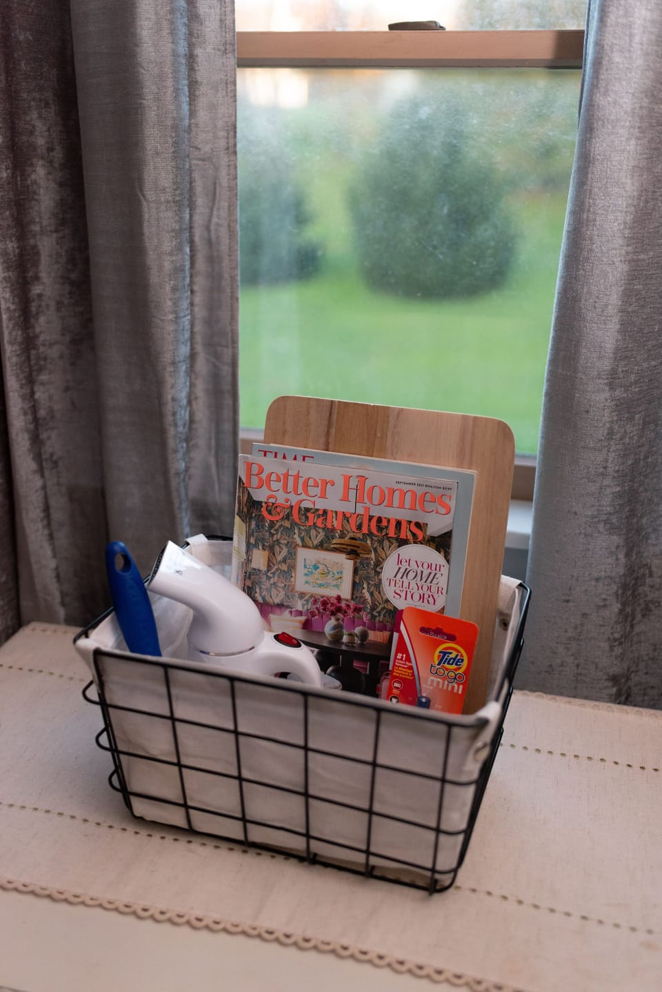 "Forgot something?" basket, tide pen, chargers, lint roller, steamer, sewing kit