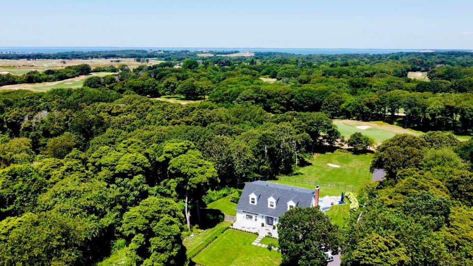 High above the estate you can see all four of Southampton's top golf courses and the Peconic Bay
