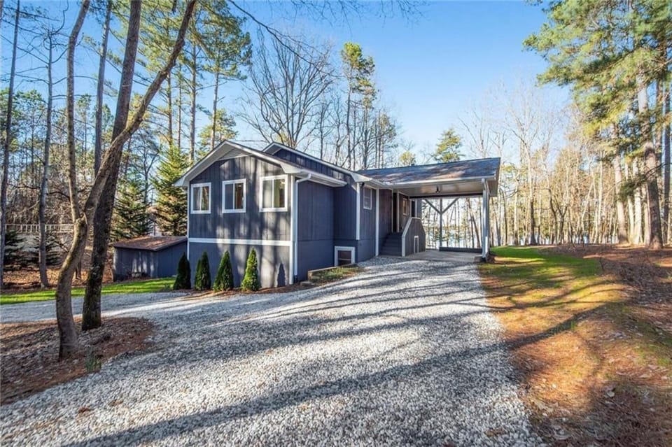 Covered carport in circular driveway...great for large vehicles and trailers