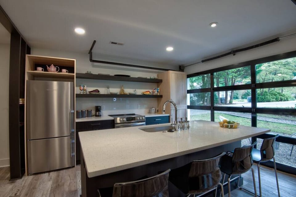 Chef’s Dream Kitchen – Fully equipped with stainless steel appliances, quartz countertops, and everything you need for gourmet meals