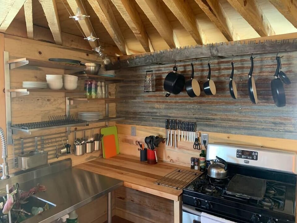 Cooks kitchen ready to go - gas range and oven, no microwave.