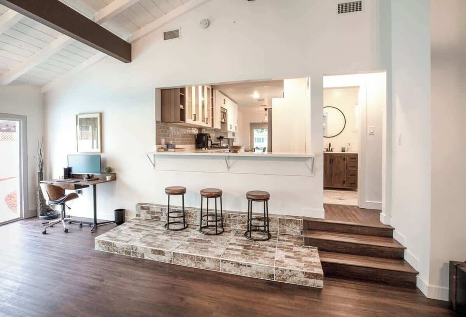 Bar seating to watch TV and chat kitchen side