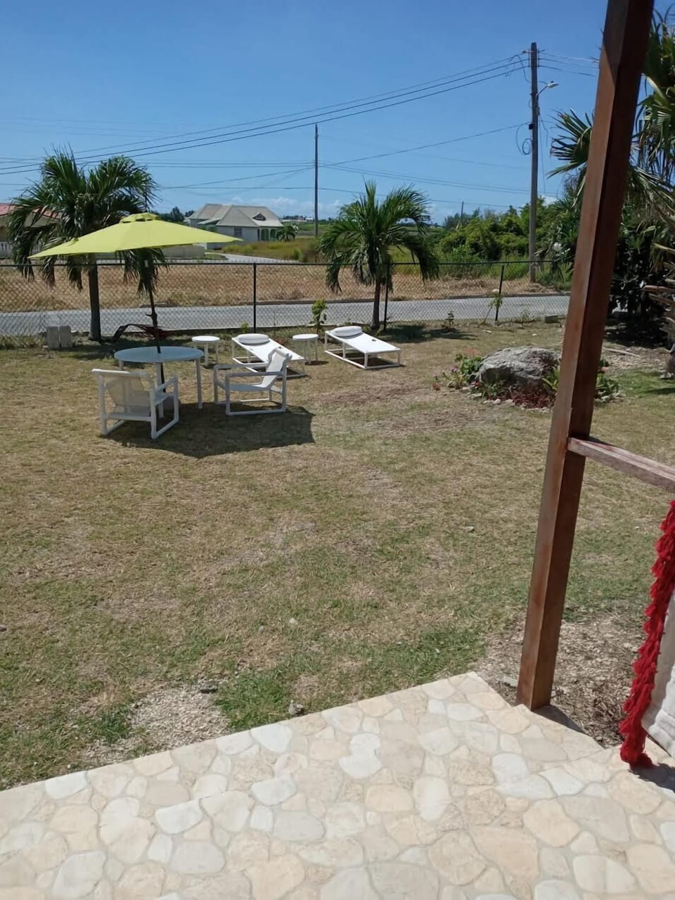 alfresco dining/lounging in enclosed garden area